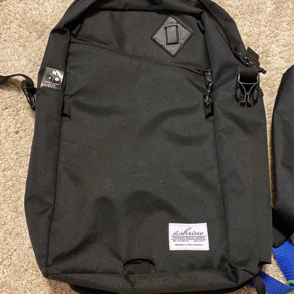 Modular daypack plus water bottle pocket